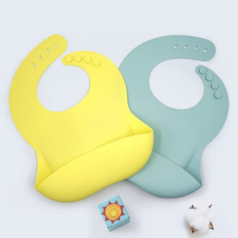 Leanbh silicone bib leanbh silicone soladach póca uiscedhíonach uiscedhíonach uiscedhíonach agus cruthúnas salachar bib leanbh